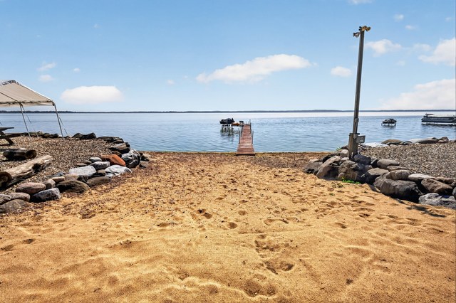130 feet of walk-in sand beach