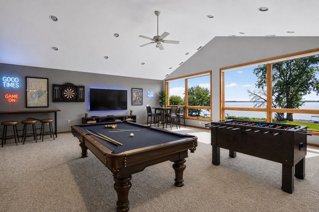 Game room with lake view (virtually staged)