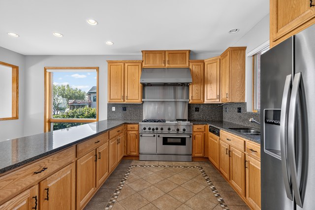 Gas range and stainless appliances