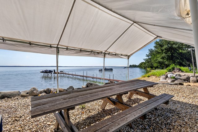Shaded lakeside seating area